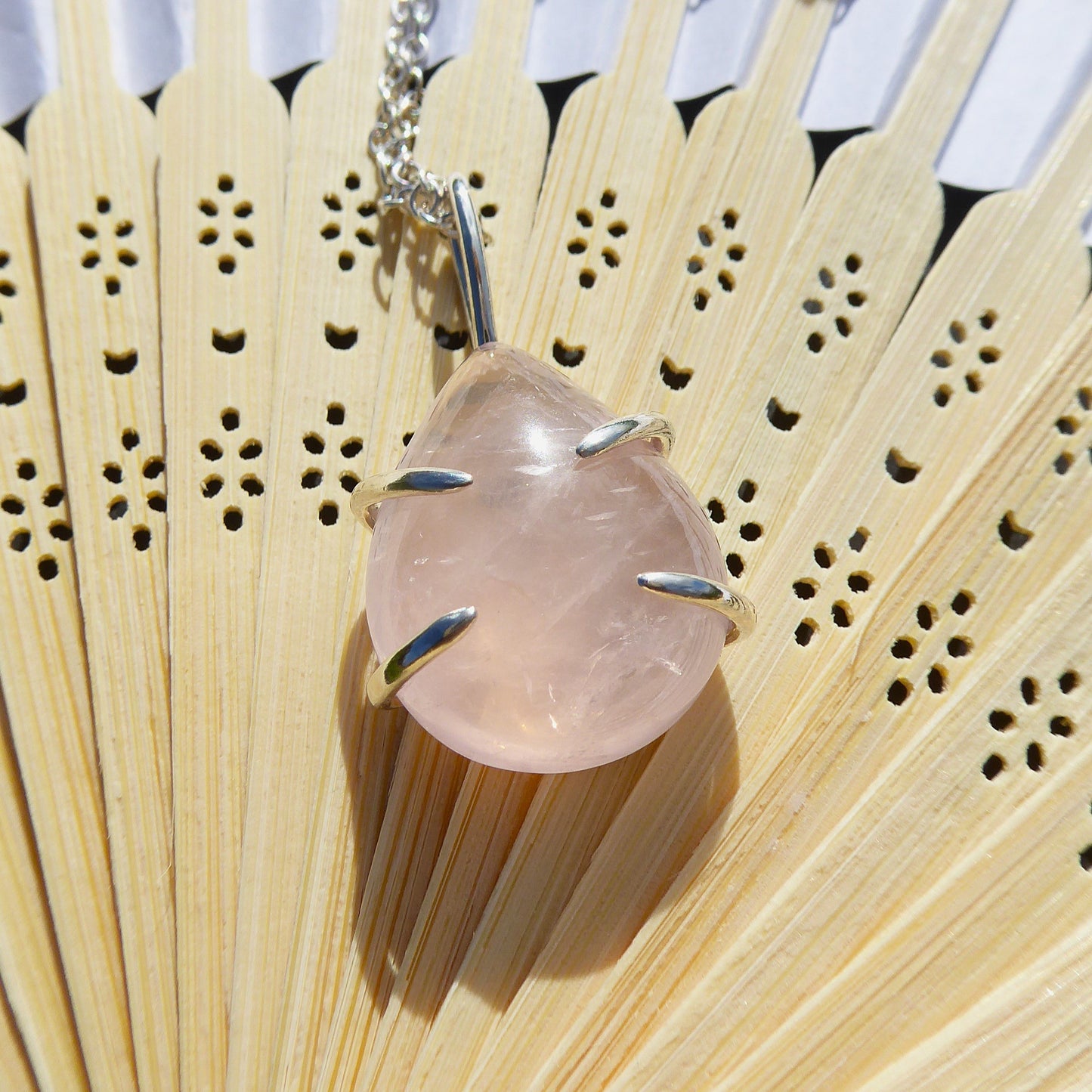 Teardrop shaped Rose Quartz stone set in Sterling Silver. Handmade one of a kind pendant.