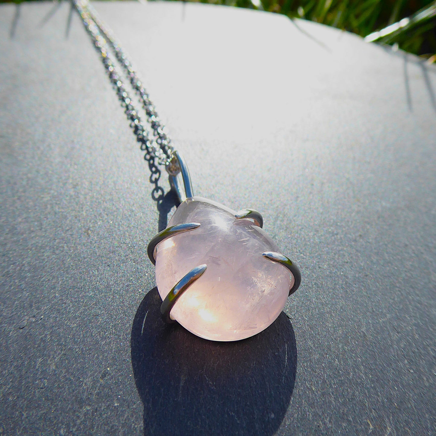 Teardrop shaped Rose Quartz stone set in Sterling Silver. Handmade one of a kind pendant.