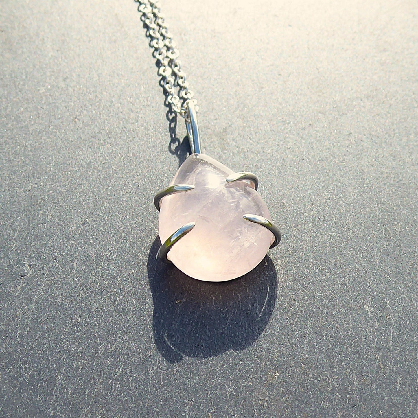Teardrop shaped Rose Quartz stone set in Sterling Silver. Handmade one of a kind pendant.