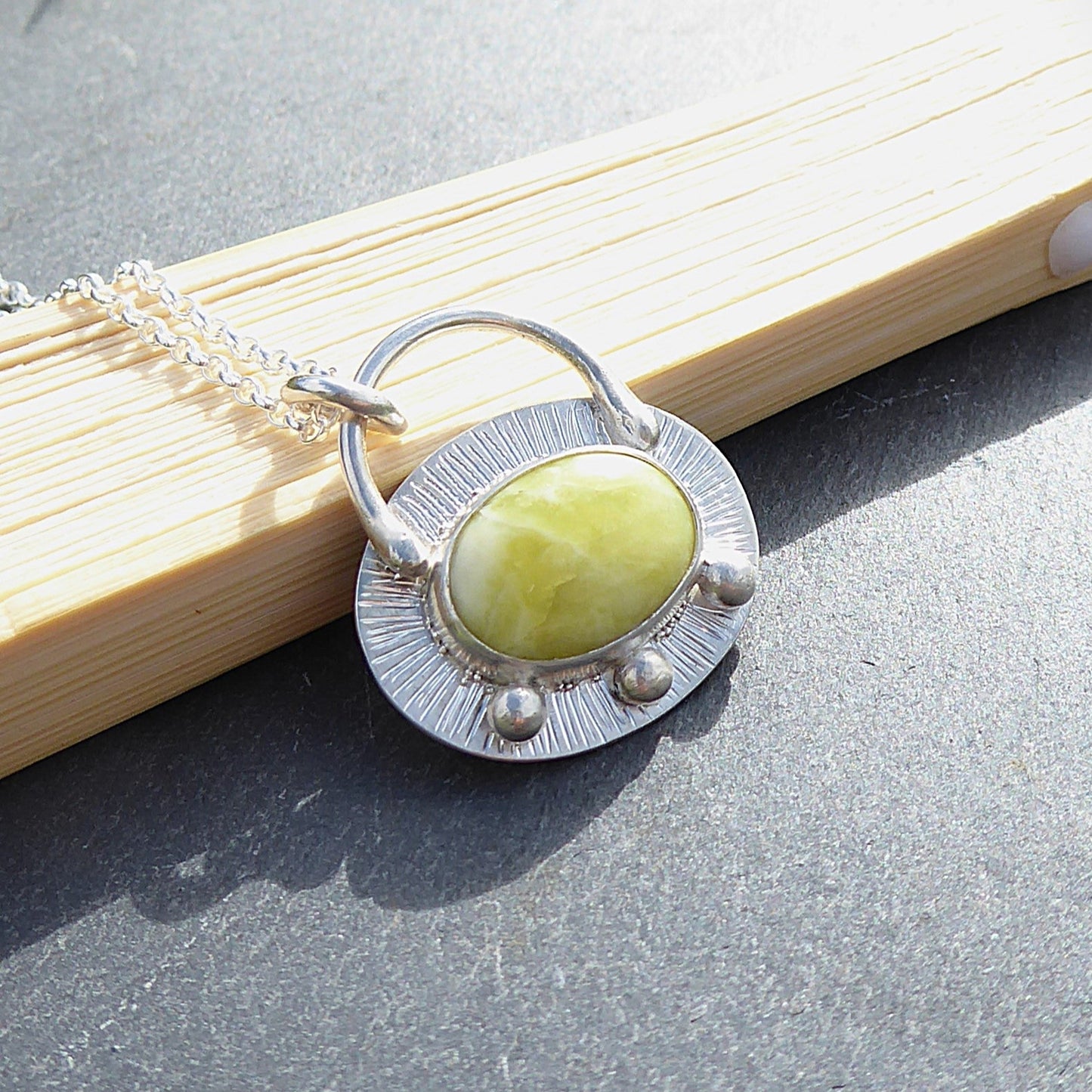Scottish marble set in fine/sterling silver. Handmade one of a kind pendant.