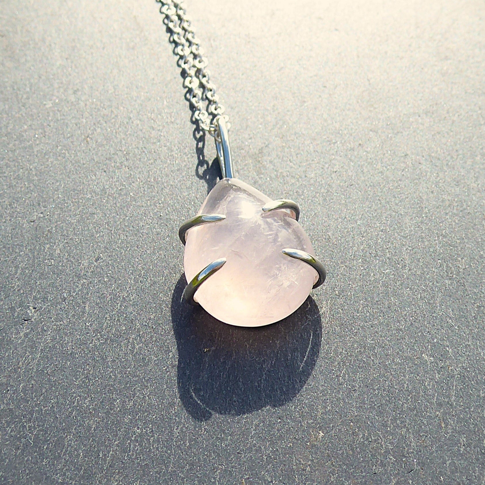 Teardrop shaped Rose Quartz stone set in Sterling Silver. Handmade one of a kind pendant.